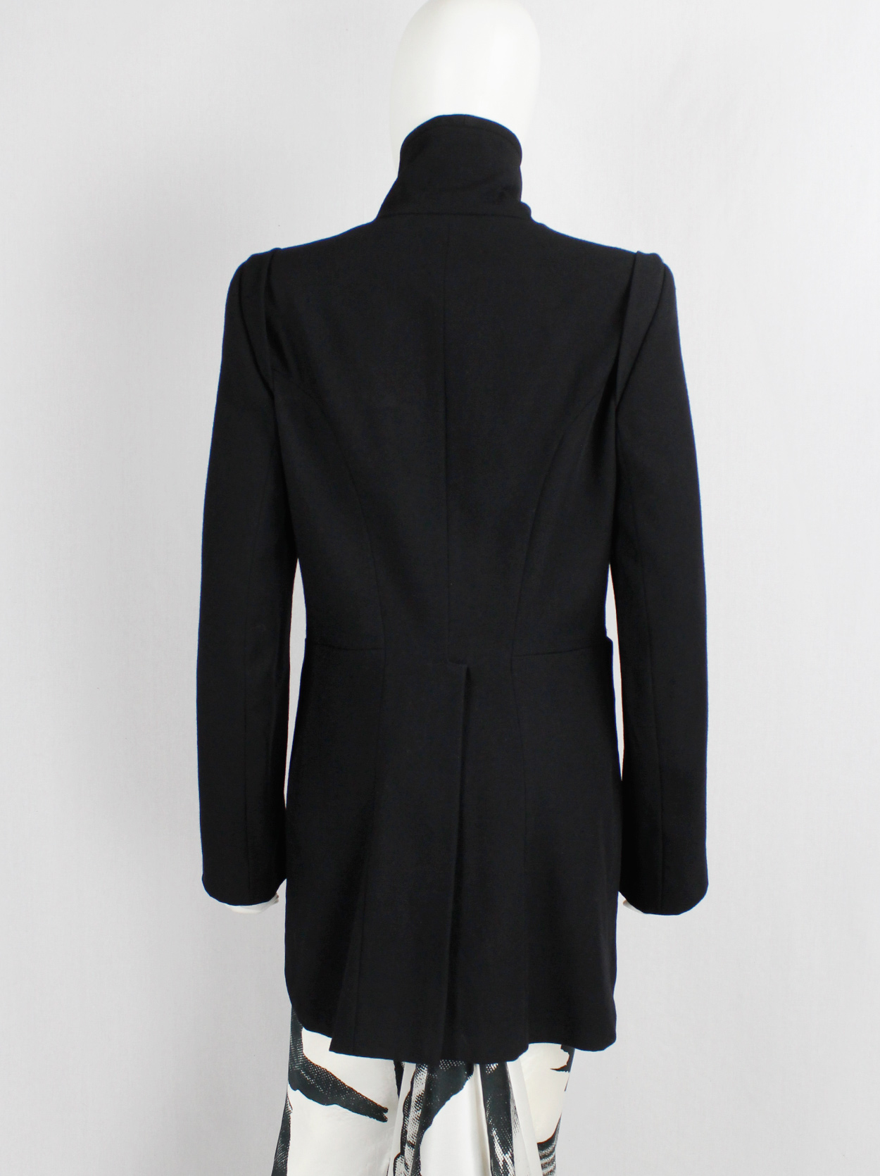Ann Demeulemeester black cutaway tailcoat with curved buttoned front ...