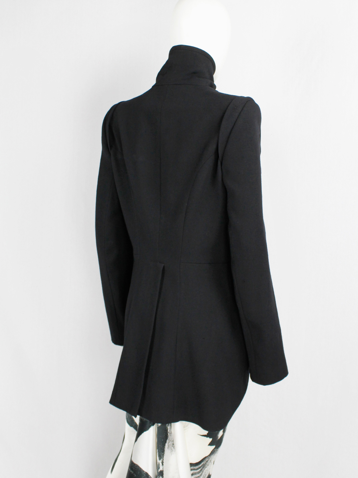 Ann Demeulemeester black cutaway tailcoat with curved buttoned front ...