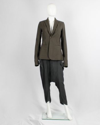 Rick Owens green minimalist blazer with geometric lapels and extra long sleeves