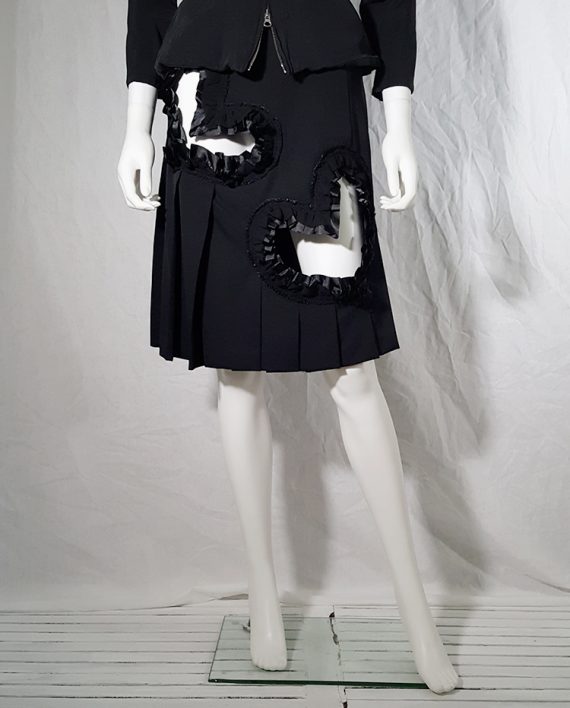 Comme des Garçons black pleated skirt with ruffled hearts cut outs ...