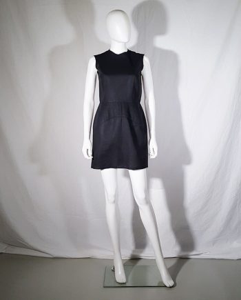 vintage Comme des Garçons black dress with padded hips — fall 1998