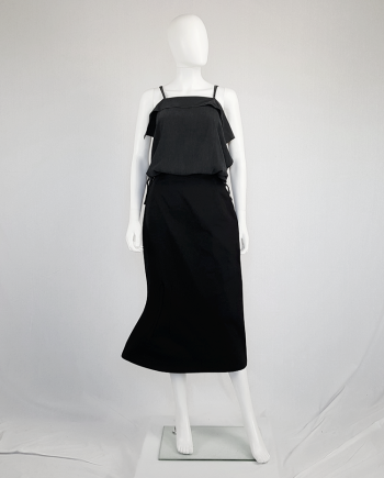 Yohji Yamamoto black structured skirt with sideways curve.