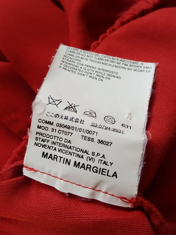Maison Martin Margiela red dress with pink strap across the chest ...