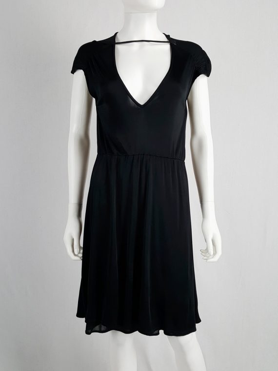 Maison Martin Margiela black dress with strap across the chest — spring ...