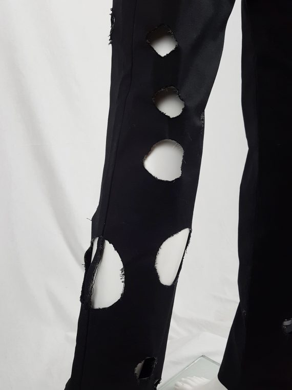 Yohji Yamamoto black trousers with circle cutouts runway spring 2010 124141