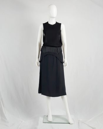 Maison Martin Margiela black dress worn as a skirt — spring 2003