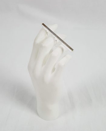 Margiela MM6 clear ring with silver strip across the fingers — spring 2013