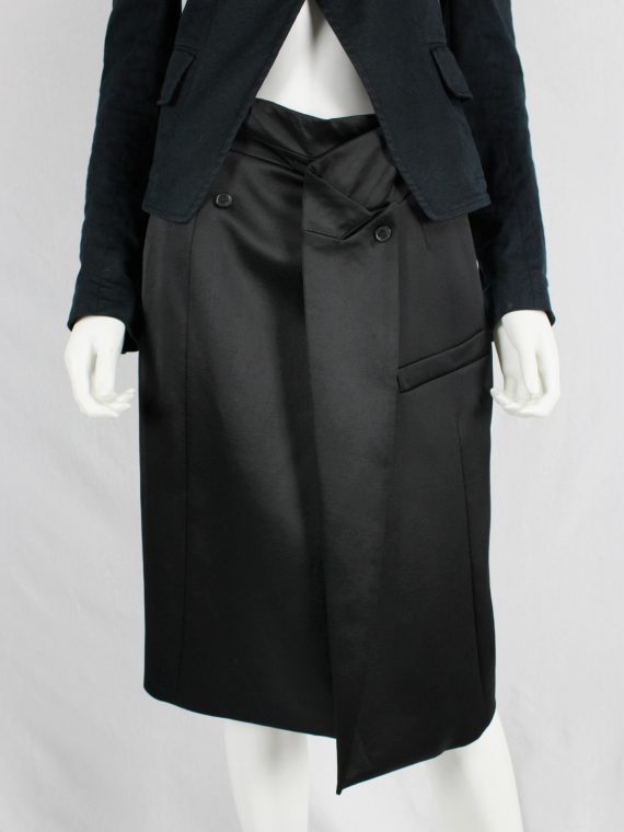 Ann Demeulemeester black long coat with asymmetric button closure