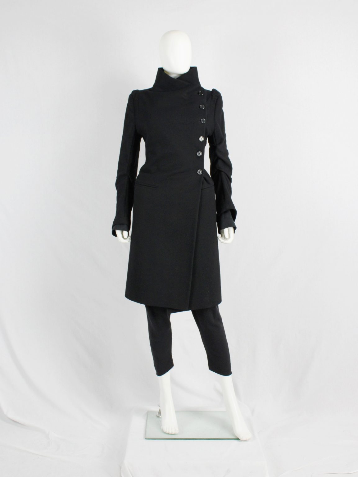 Ann Demeulemeester black long coat with asymmetric button closure