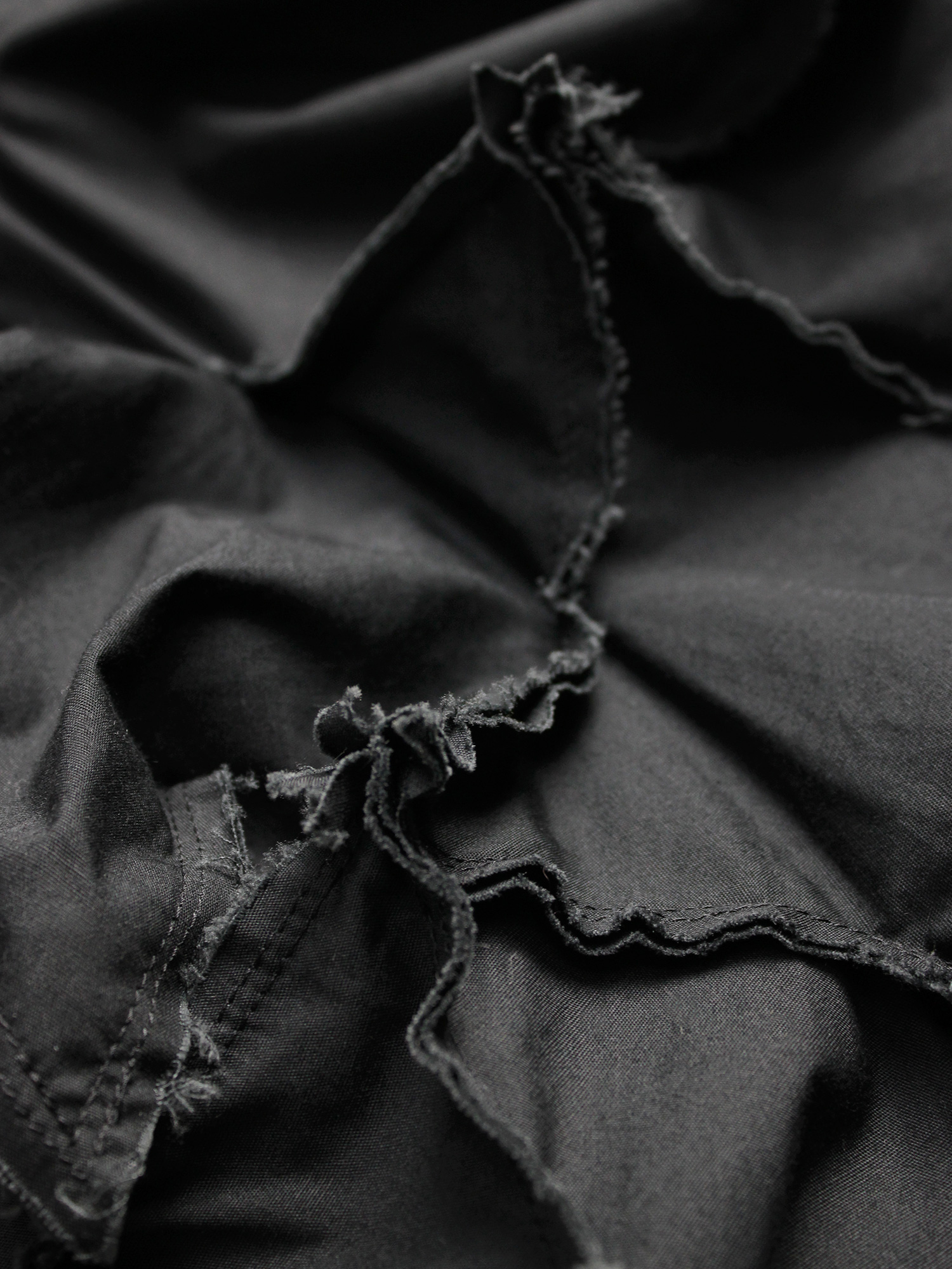 Comme des Garçons black sleeveless top with 3D stars at the hem — AD ...