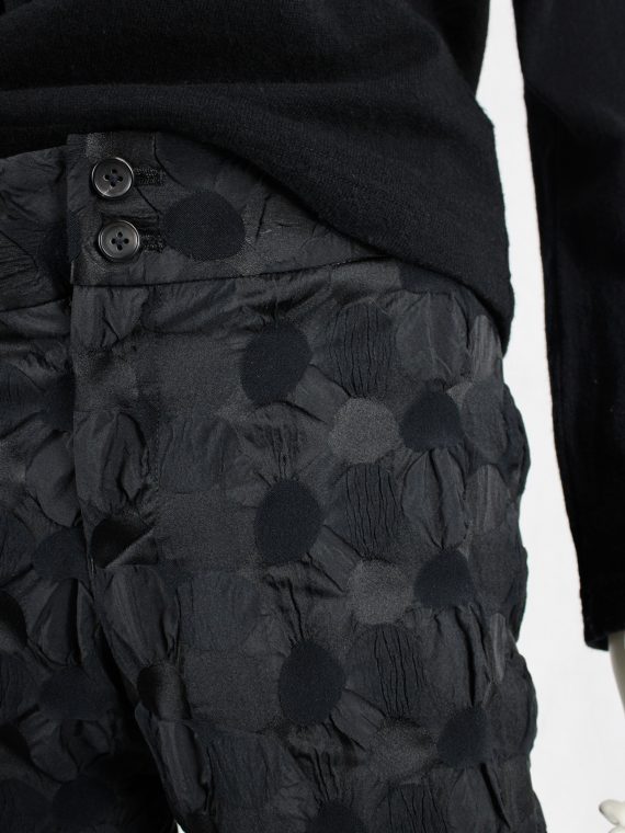 Issey Miyake black trousers with the fabric manipulated into different ...