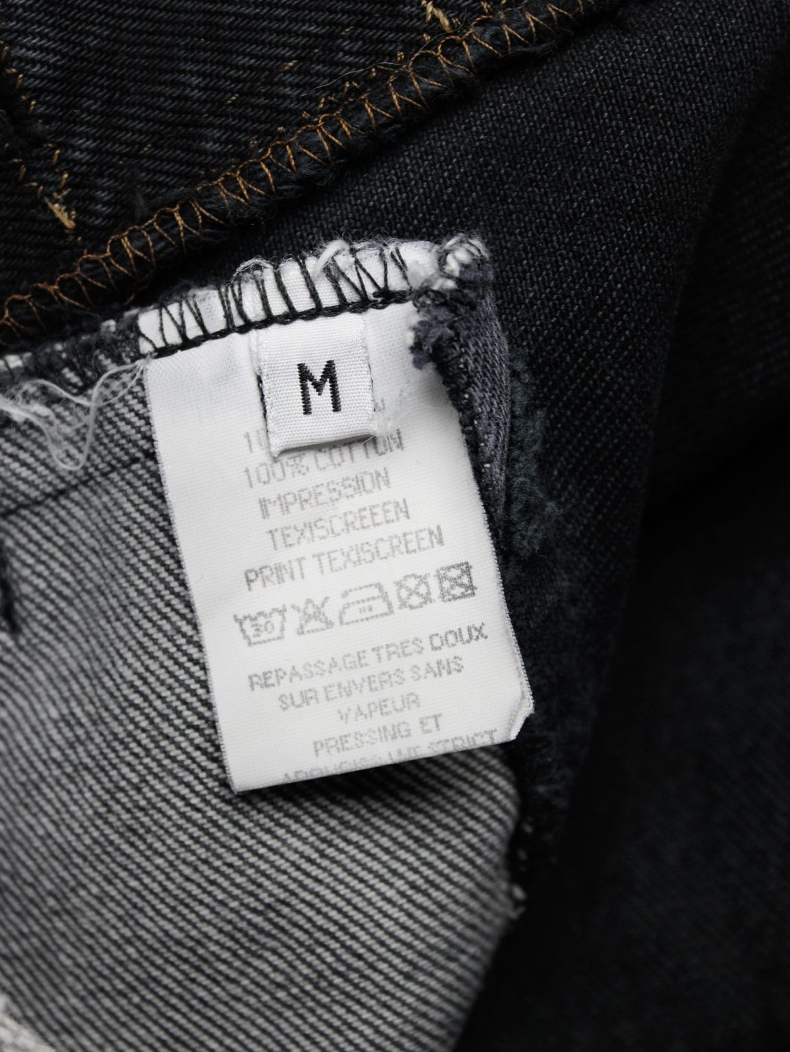 Maison Martin Margiela artisanal denim trousers with cut-off waist and circle print — fall 1998