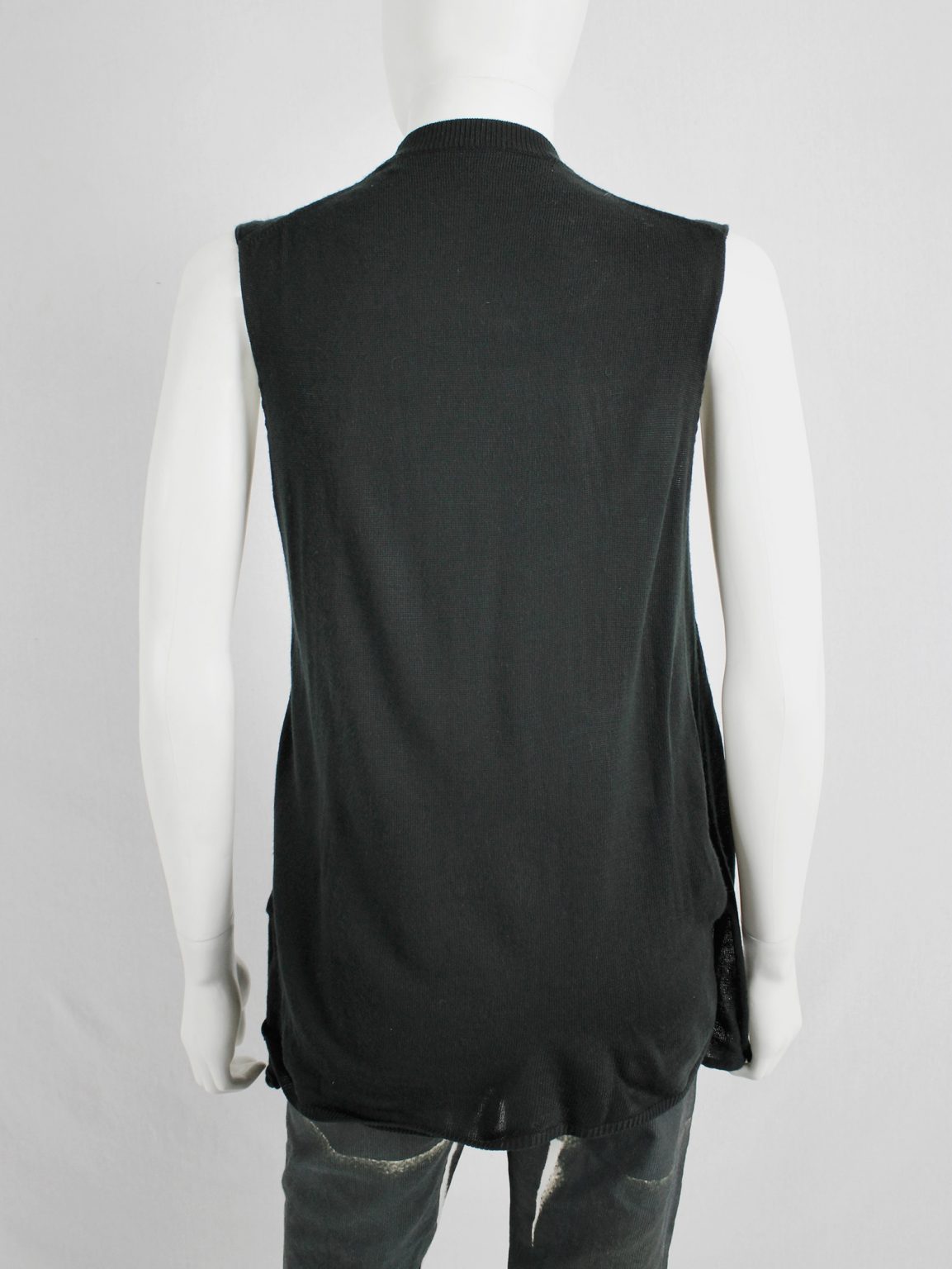 Comme des Garçons black knit top with long drooping strips — spring 2015