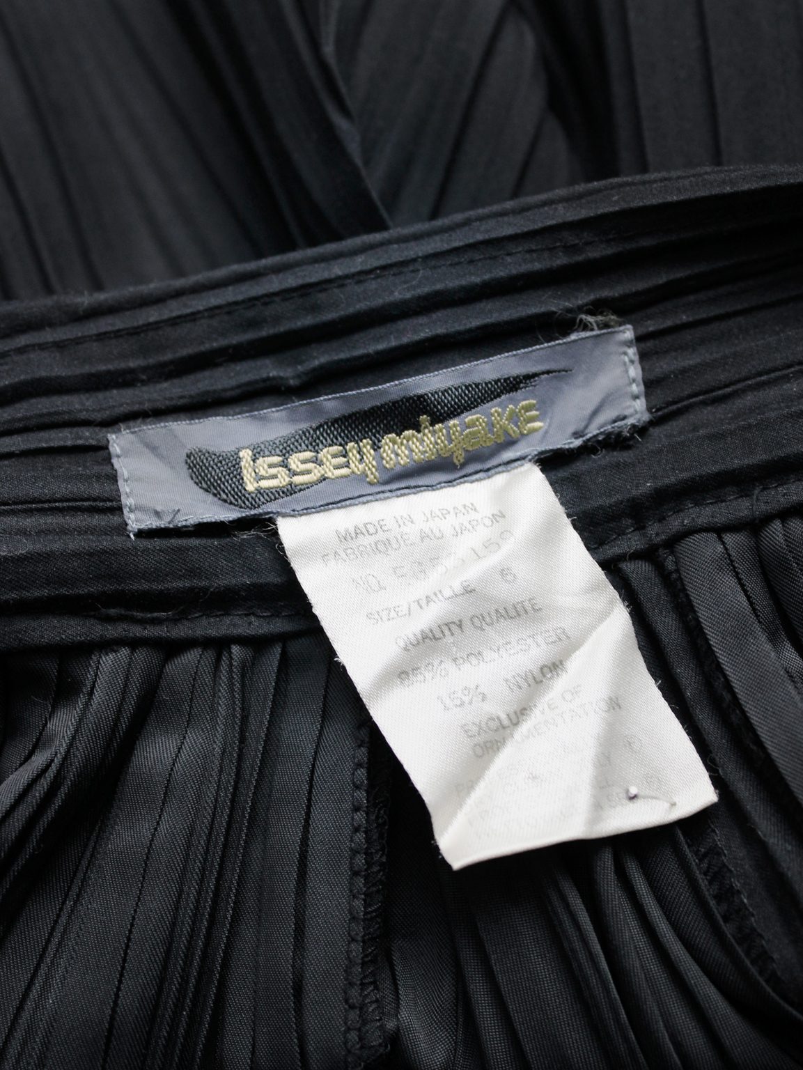 Issey Miyake black flared skirt with creased pleats — 1980's