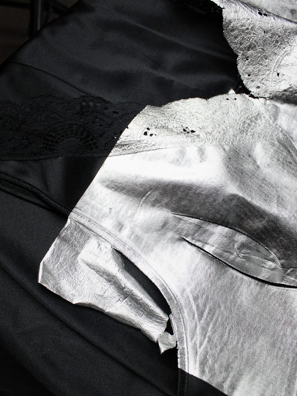 Maison Martin Margiela artisanal black lace dress with pressed silver foil — spring 2003