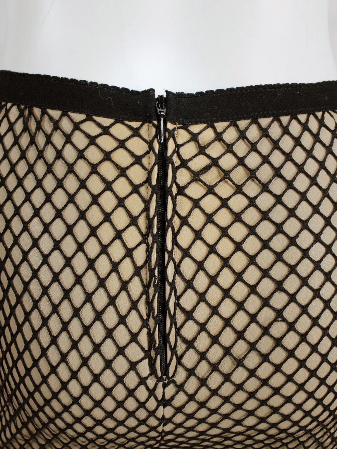 Maison Martin Margiela nude leather trousers with black fishnet overlayer — fall 2011