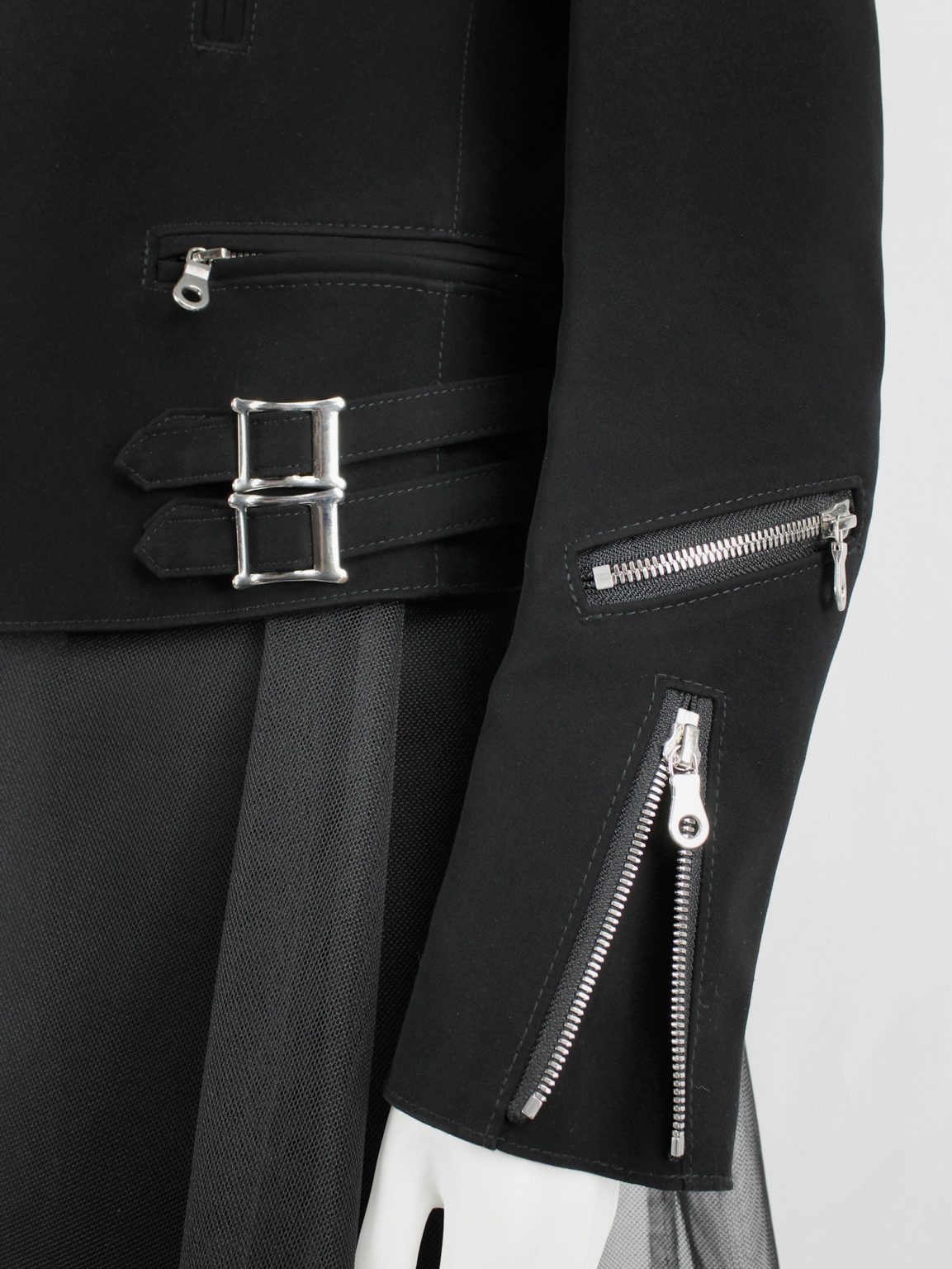 Noir Kei Ninomiya black bicker jacket with pearls around the sleeves — spring 2015