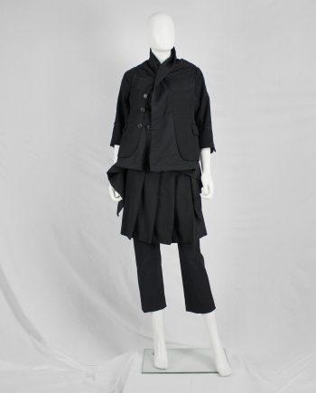 Comme des Garçons dark blue coat with drape and trompe-l'oeil seams — fall 2009