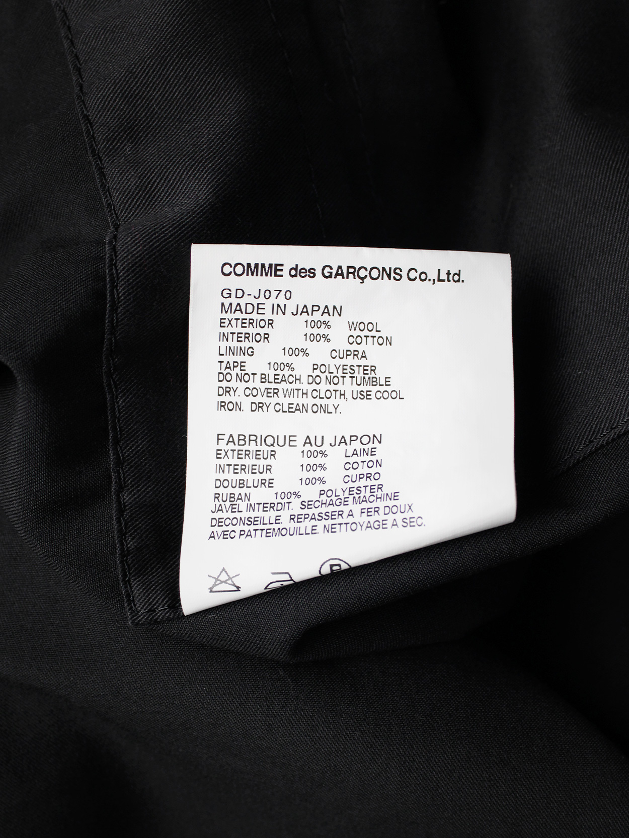 Comme des Garçons dark blue coat with drape and trompe-l'oeil seams ...