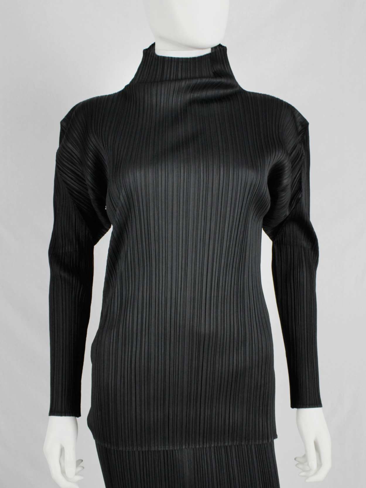 Issey Miyake black turtleneck jumper with fine pressed pleats - V A N ...