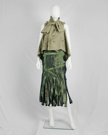 Issey Miyake holographic green skirt made of fabric strips — fall 2002