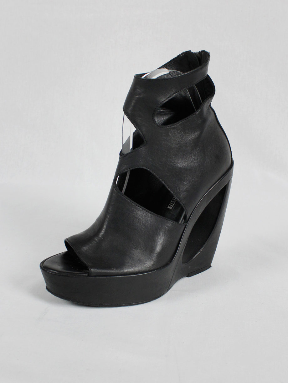 Ann Demeulemeester black platform boots with cut-out curved heel (37) — spring 2013