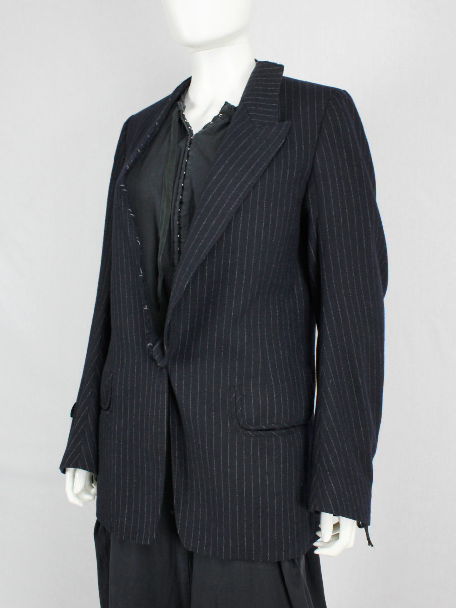 Maison Martin Margiela pinstripe blazer with detached lapel and 'exclusive fabric' tags — fall 2004
