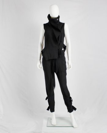 Ann Demeulemeester black trousers with wide belt straps around the ankles