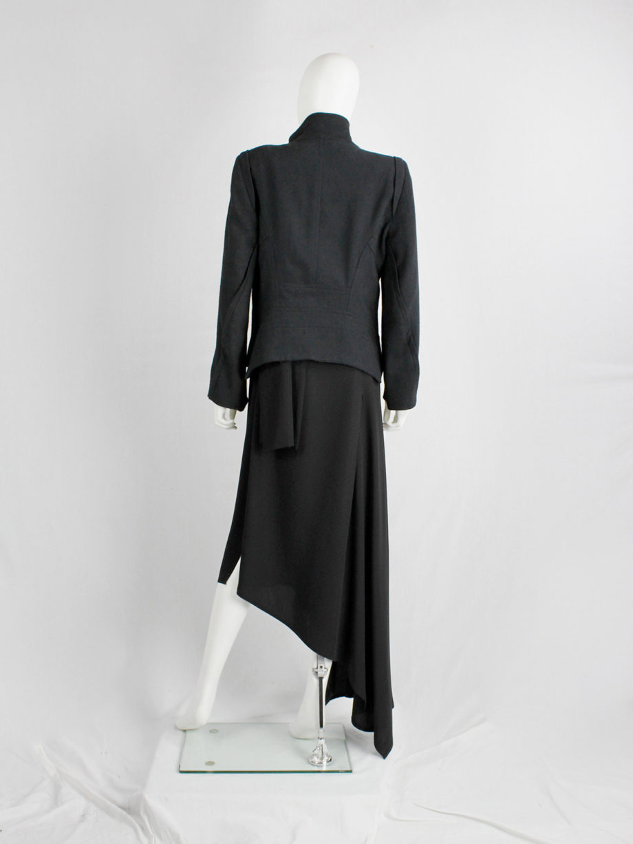Ann Demeulemeester black coat with standing neckline and asymmetric button closure fall 2010 (1)
