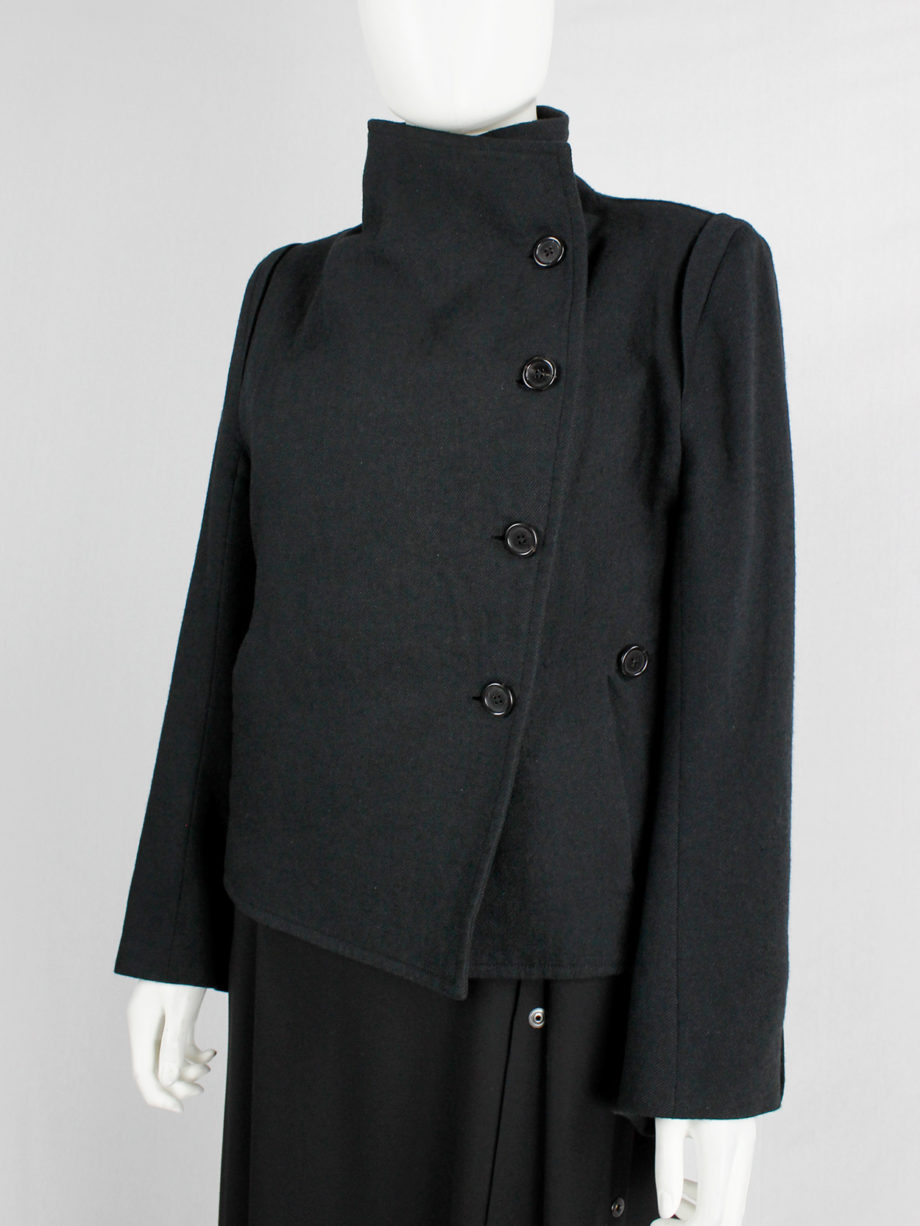 Ann Demeulemeester black coat with standing neckline and asymmetric button closure fall 2010 (9)
