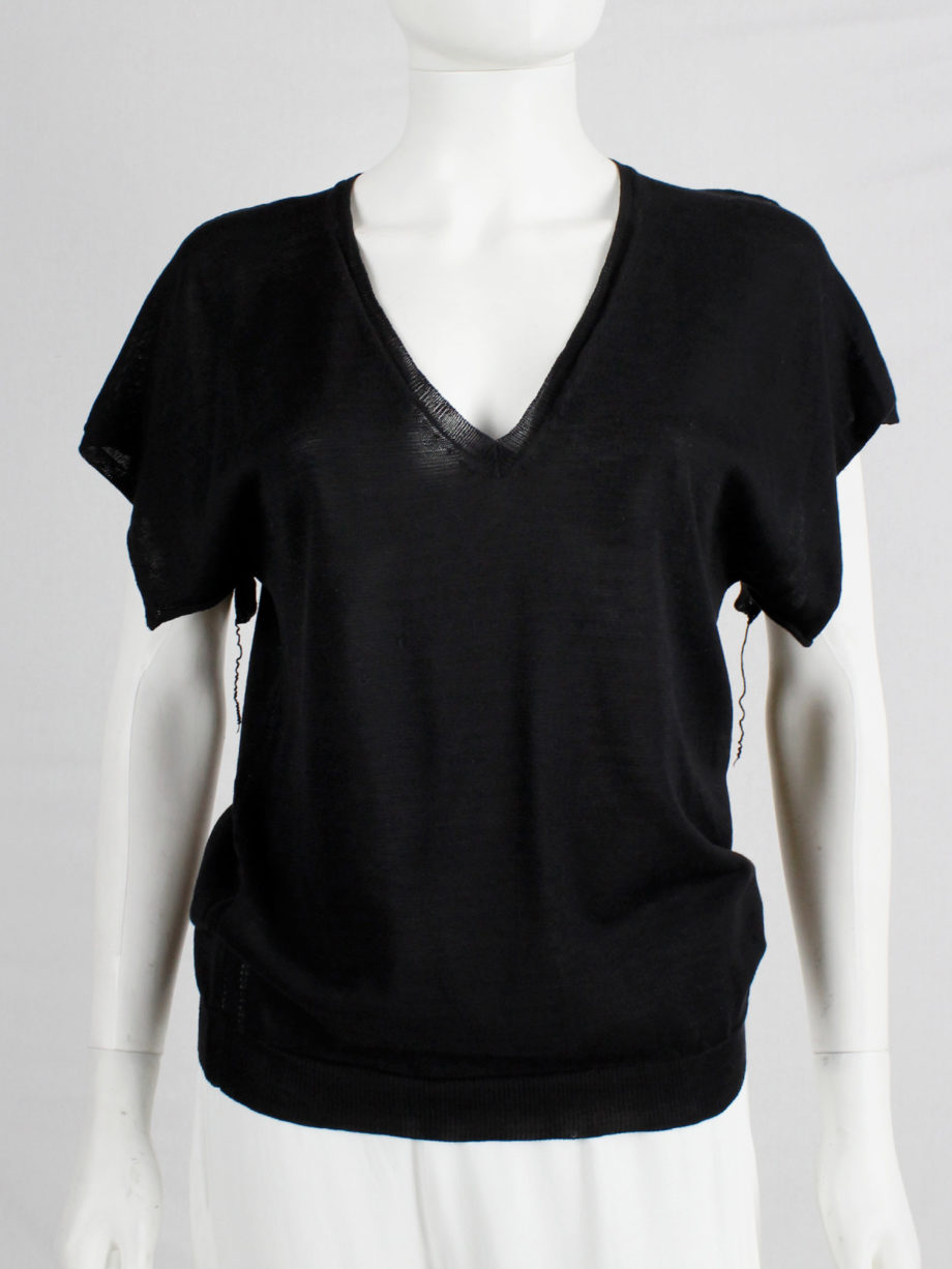Maison Martin Margiela black t-shirt with cut open sleeves and hanging loose threads spring 2003 (1)