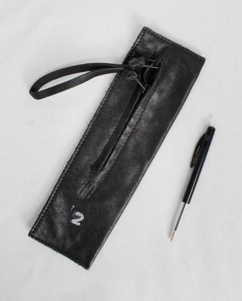 Nico Uytterhaegen black leather pouch with double zipper strap