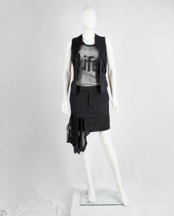 A.F. Vandevorst black short skirt with a sheer sideways shirt as a lining — spring 2017