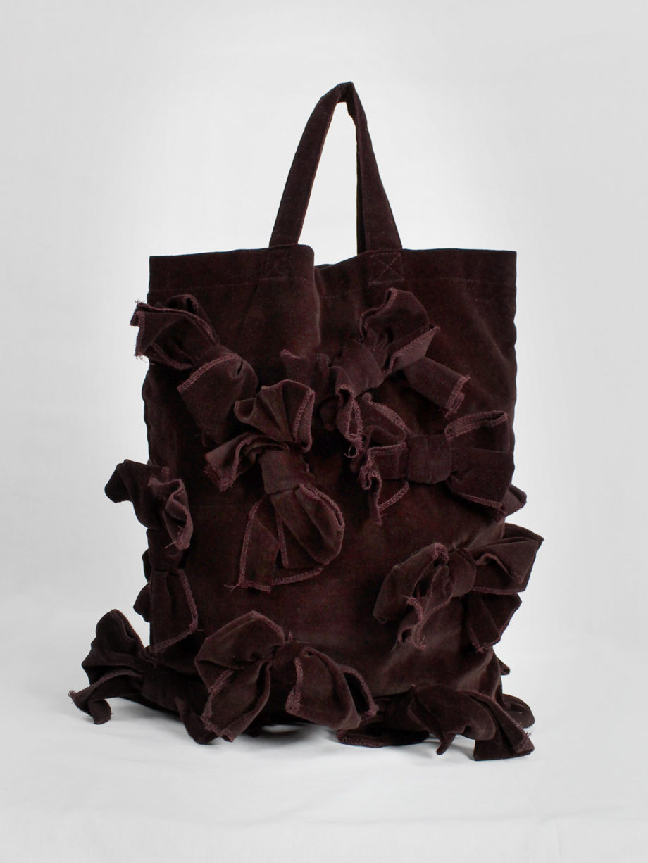 Comme des Garçons Comme burgundy velvet tote bag covered in bows