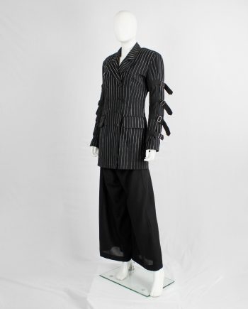 Marithe + Francois Girbaud navy pinstripe blazer with belts around the sleeves