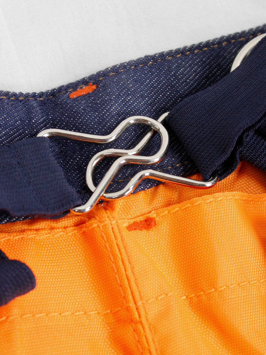 Walter Van Beirendonck WaLT denim trousers as a belt with neon orange lining (1)