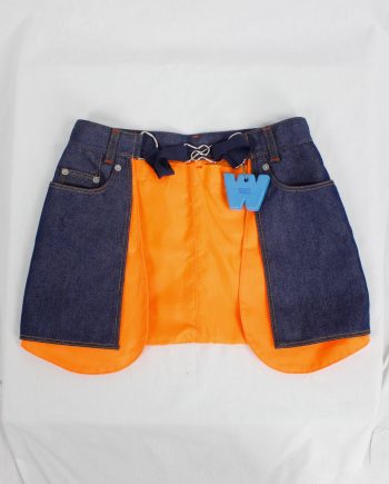 Walter Van Beirendonck W&LT denim trousers as a belt with neon orange lining — 1990's
