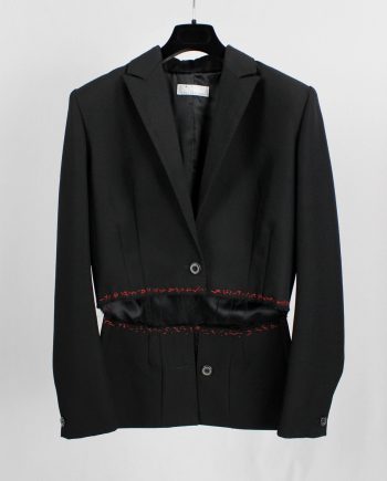 Jurgi Persoons black blazer deconstructed into a tailcoat with red stitches — fall 1999