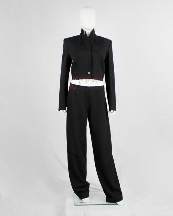 Jurgi Persoons black loose trousers with red stitched waistband and spiral waist — fall 1999