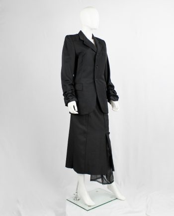 Comme des Garçons black blazer with scrunched lining coming out of the sleeves — AD 1992