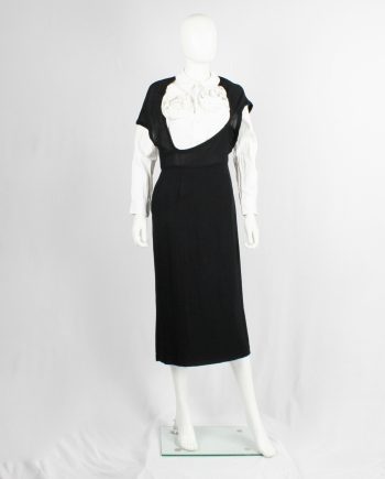 Comme des Garçons black dress with deformed upper and extra low neckline — spring 1999