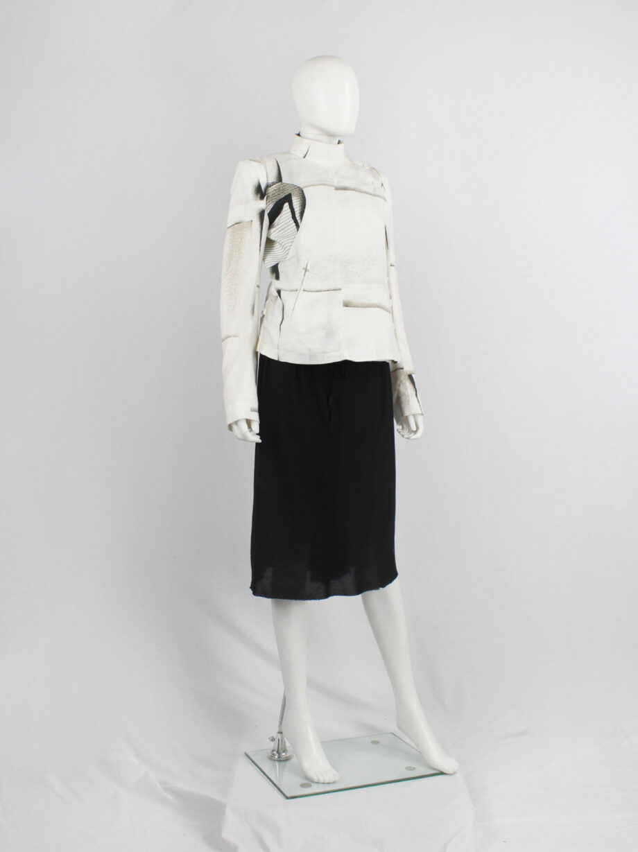 Ann Demeulemeester white buttoned fencing jacket with stitched panels spring 2011 (19)