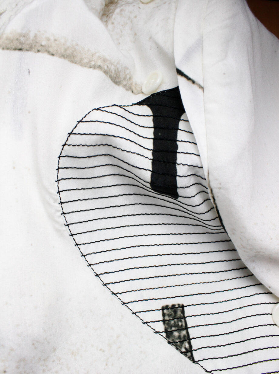 Ann Demeulemeester white buttoned fencing jacket with stitched panels spring 2011 (2)