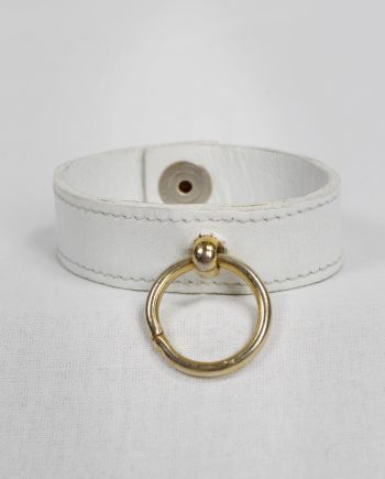 Xavier Delcour white leather bracelet with gold bondage ring