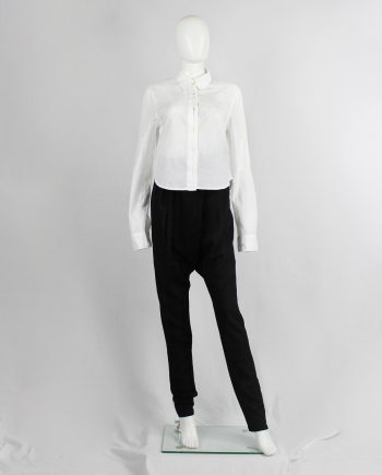 Ann Demeulemeester white cropped shirt with extra long sleeves and semi-covered buttons
