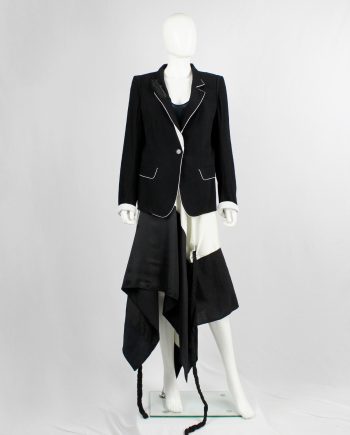 Ann Demeulemeester for Le Bon Marché dark blue blazer with white trim and feather — 2012