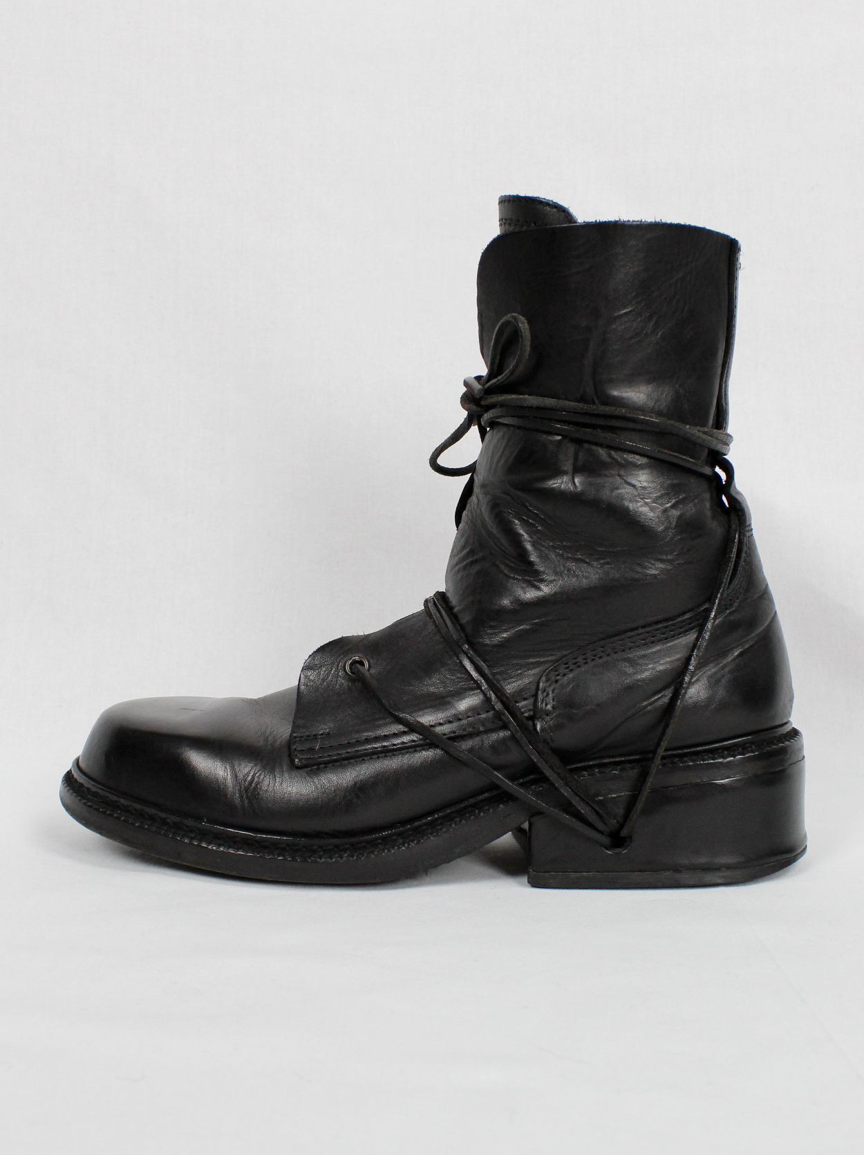 Dirk Bikkembergs black combat boots wrapped with laces through the ...