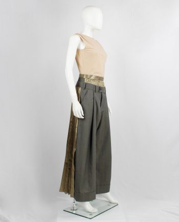 Junya Watanabe brown trousers attached to a chartreuse pleated maxi skirt — fall 2010