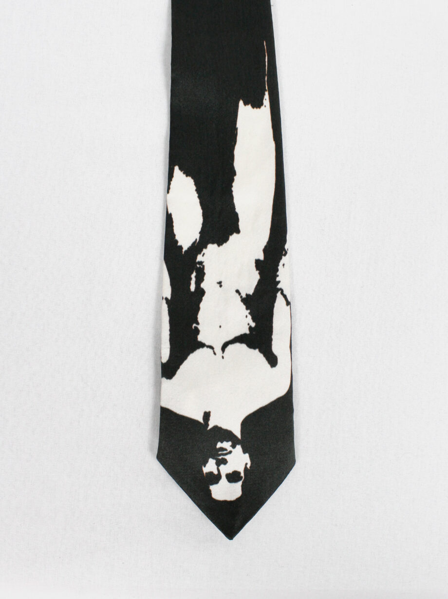 Christophe Coppens black tie with upside down bleached naked man in white (1)
