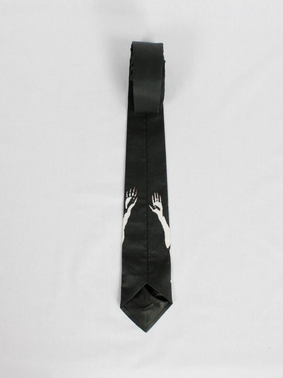 Christophe Coppens black tie with upside down bleached naked man in white (7)